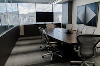 Interior of contemporary conference room with long table