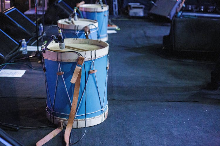 Acoustic Drum Set With Microphones On Stage