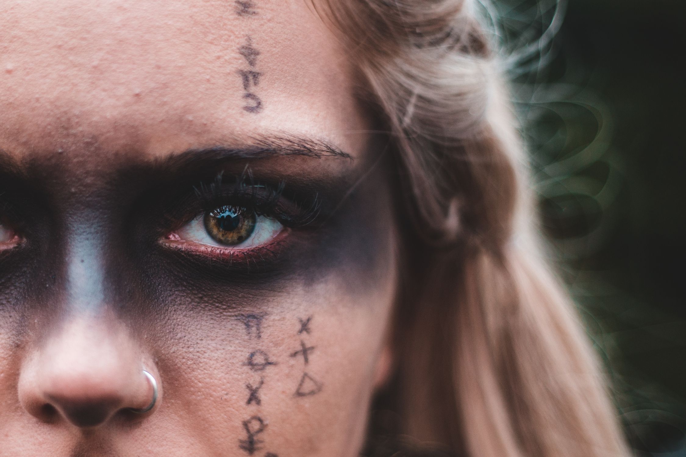 Woman with black makeup and runs · Free Stock Photo