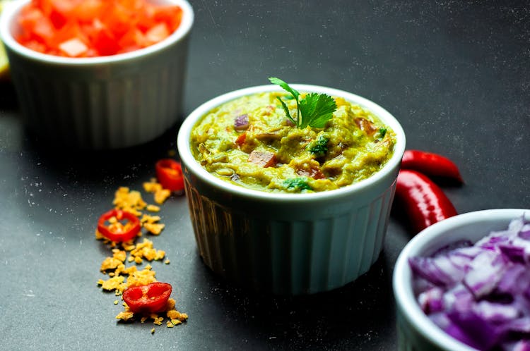 Delicious Mexican Guacamole In Ceramic Bowl