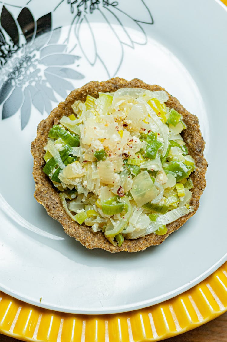 Delicious Quiche With Vegetables On Plate