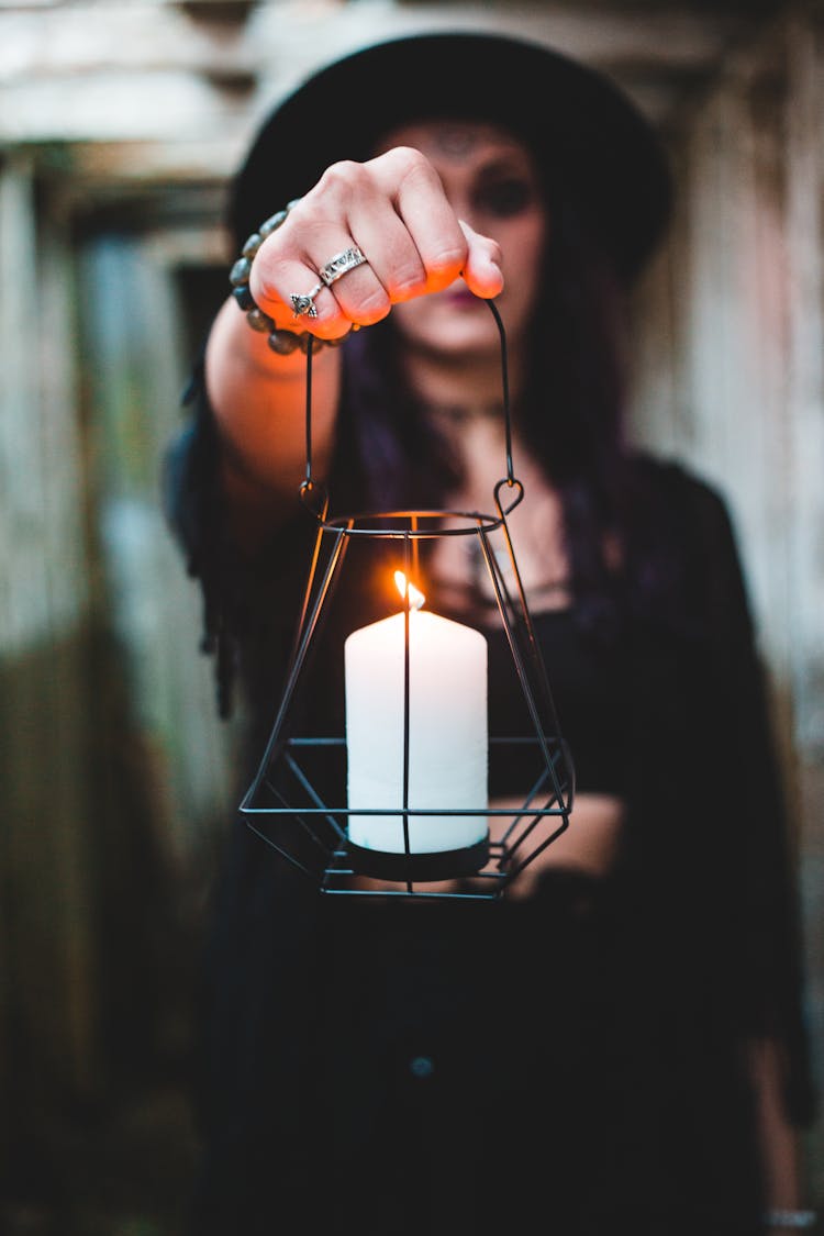 Dark Witch Holding Lantern With Candle