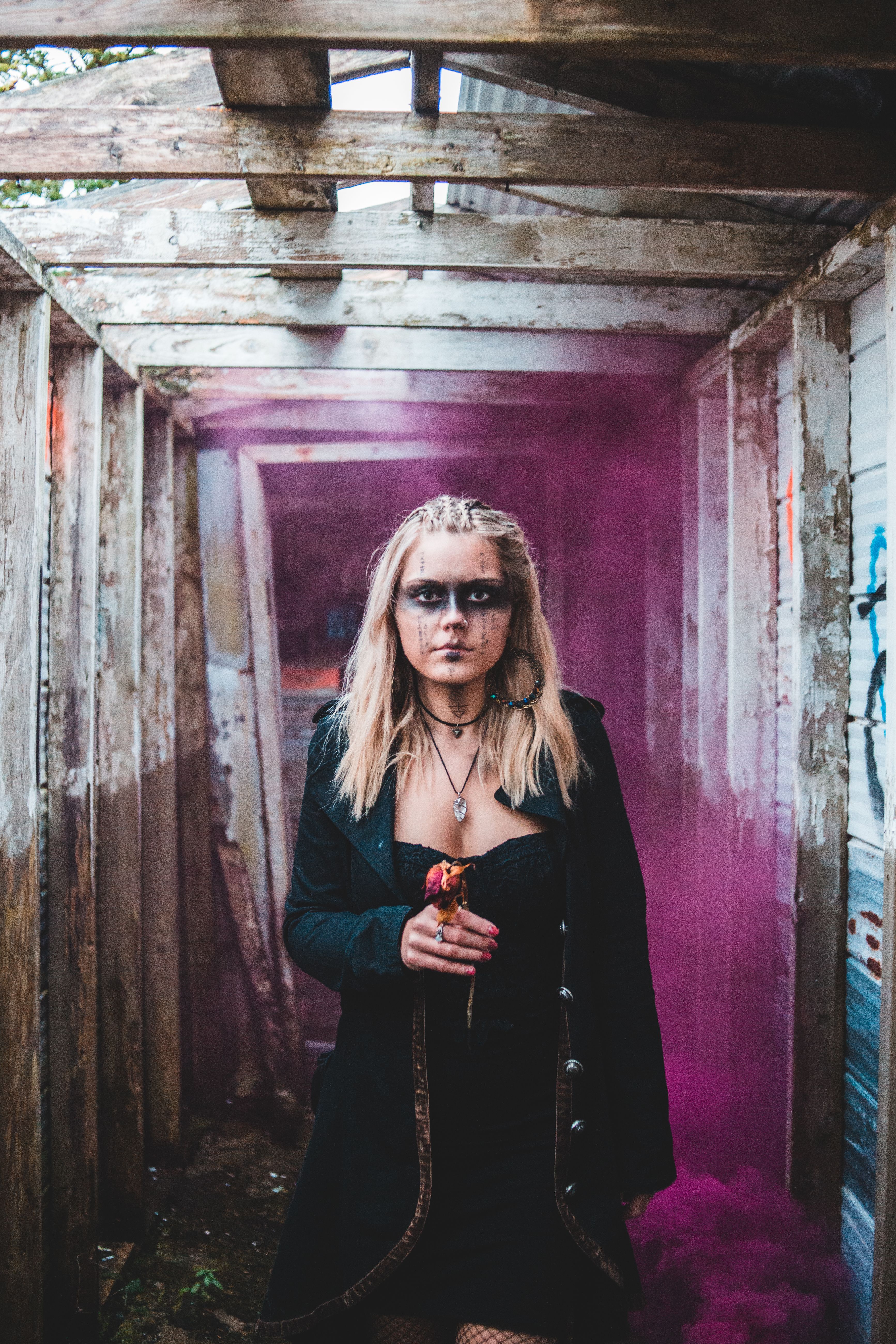 Emotionless sorceress with dry rose · Free Stock Photo