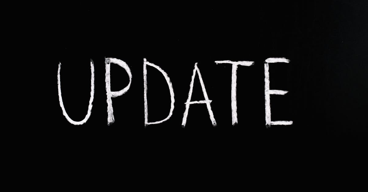 Update Lettering Text on Black Background · Free Stock Photo