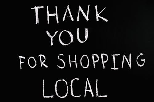 Free Thank You For Shopping Local Lettering Text on Black Background Stock Photo