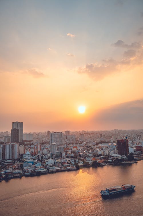 Drone Shot of a City During Sunrise