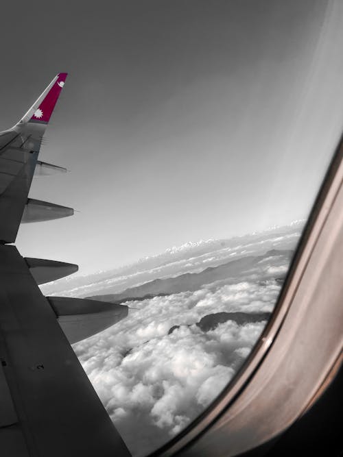 Kostnadsfri bild av flygplan, flygplansfönster, flygvinge