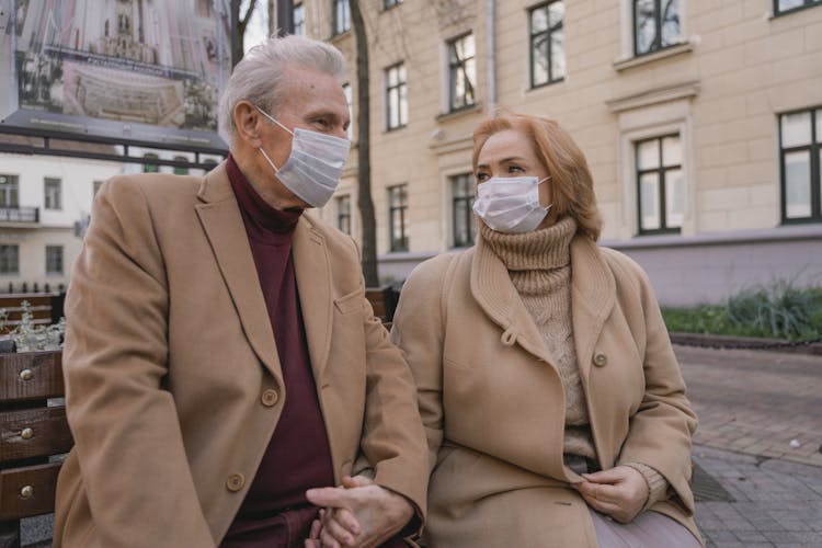 A Couple Wearing Facemasks 