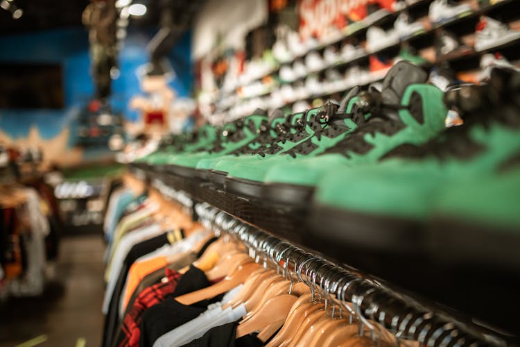 A Row Of Green And Black Shoes