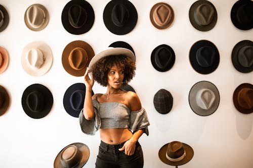 Free Woman in Blue and Black Dress Wearing Brown Hat Stock Photo