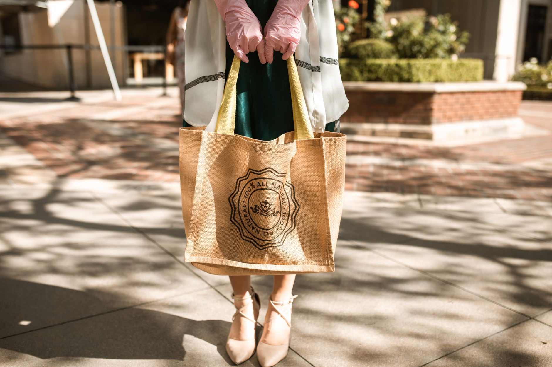 Small canvas shopping bag on wooden table