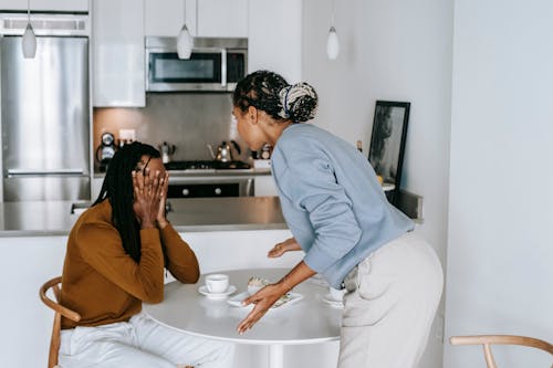 Free African American couple having conflict at kitchen Stock Photo