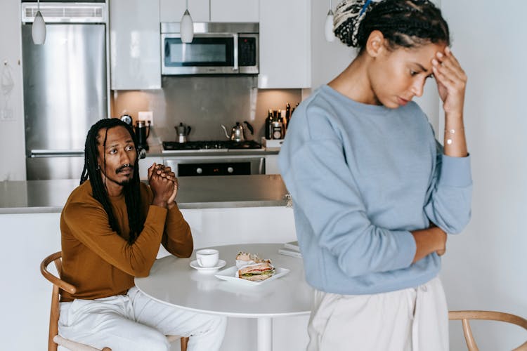 Black Couple Having Conflict At Kitchen