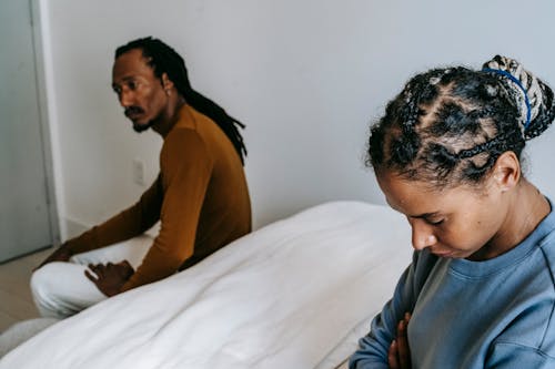 Free African American couple having conflict in bedroom Stock Photo