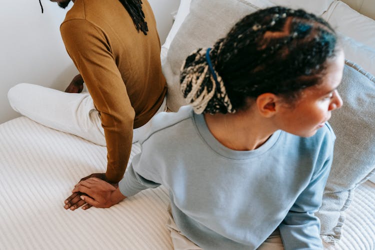 African American Couple Spending Time On Bed