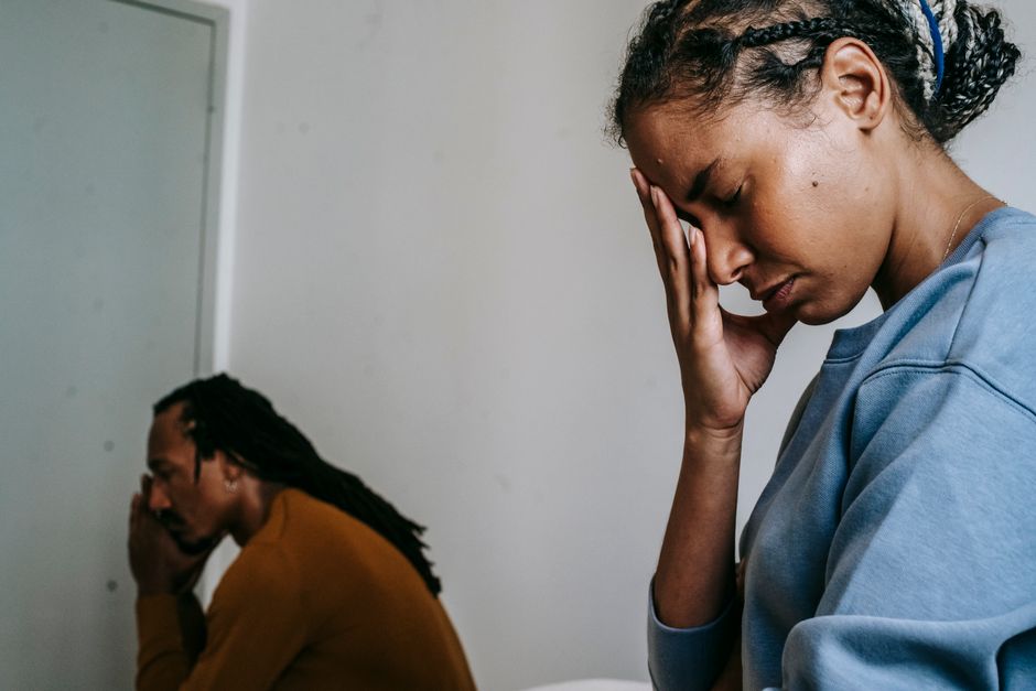 Young black couple pastime with sad face and thinking in casual clothes in daytime