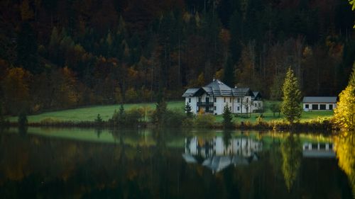 Free Beautiful autumn landscape of a lake house surrounded by trees in Ebensee, Austria. Stock Photo