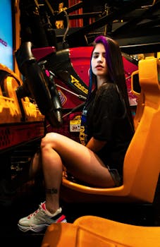 Focused woman playing an arcade game, immersed in the vibrant gaming atmosphere.