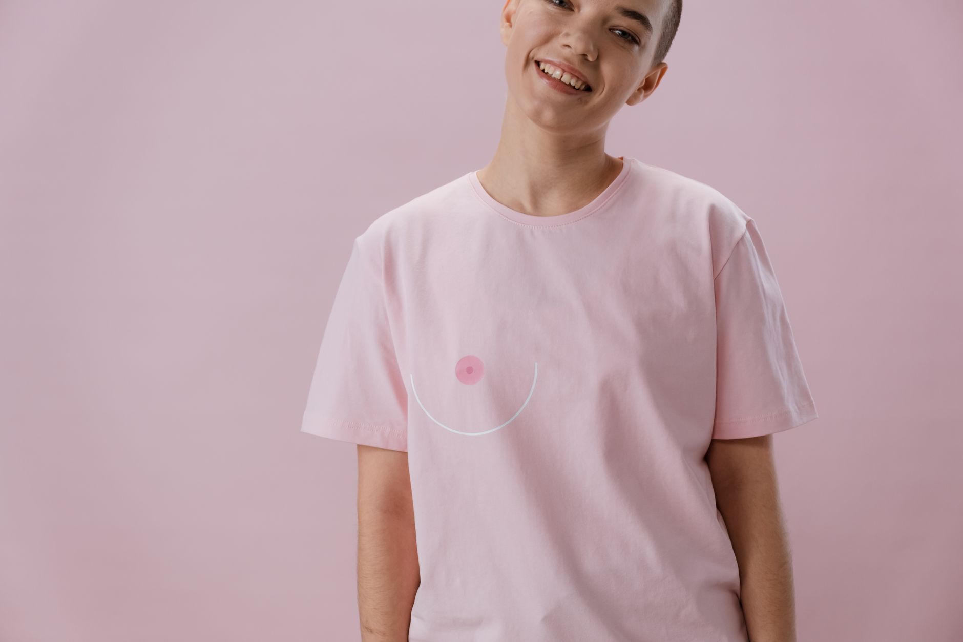 A Smiling Woman in Pink Shirt