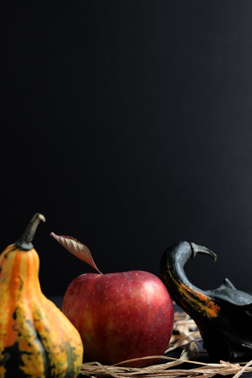 Apple and Vegetables on Black Background