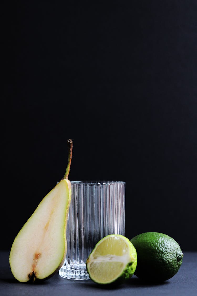 Pear Slice, Limes And Glass