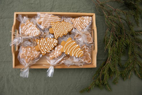 Brown Christmas Tree-Shaped Gingerbread Cookies in a Wooden Crate