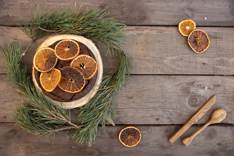 Photo Of A Christmas Cake With Dried Slices Of An Orange