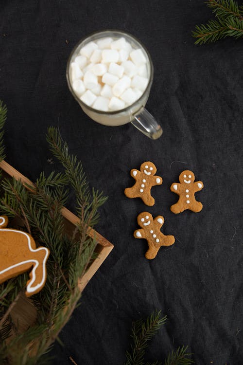 Free Cup of Drink Beside Gingerbread Cookies Stock Photo
