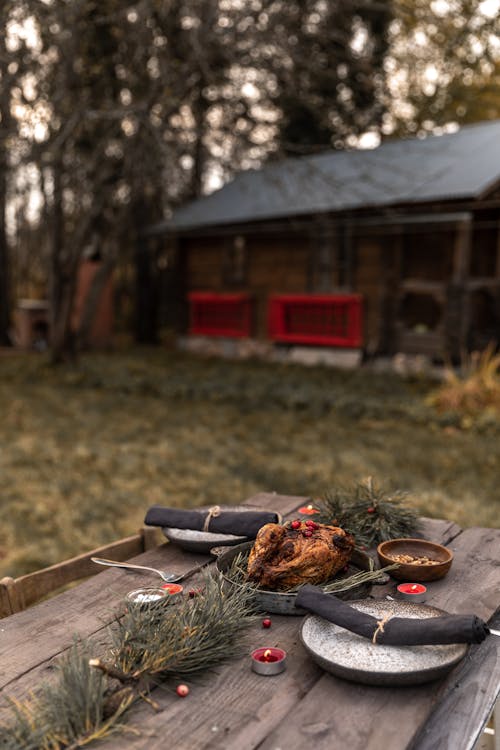 Brown Wooden Table With Cooked Turkey 