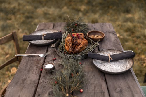 Cooked Turkey on Black Pan on Brown Wooden Table