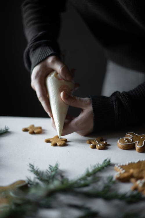 Person Frosting Gingerbread Men