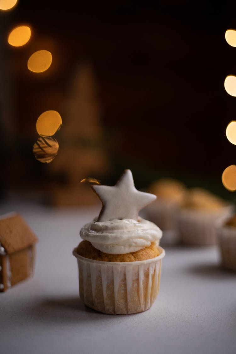 Cookie Above A Cupcake