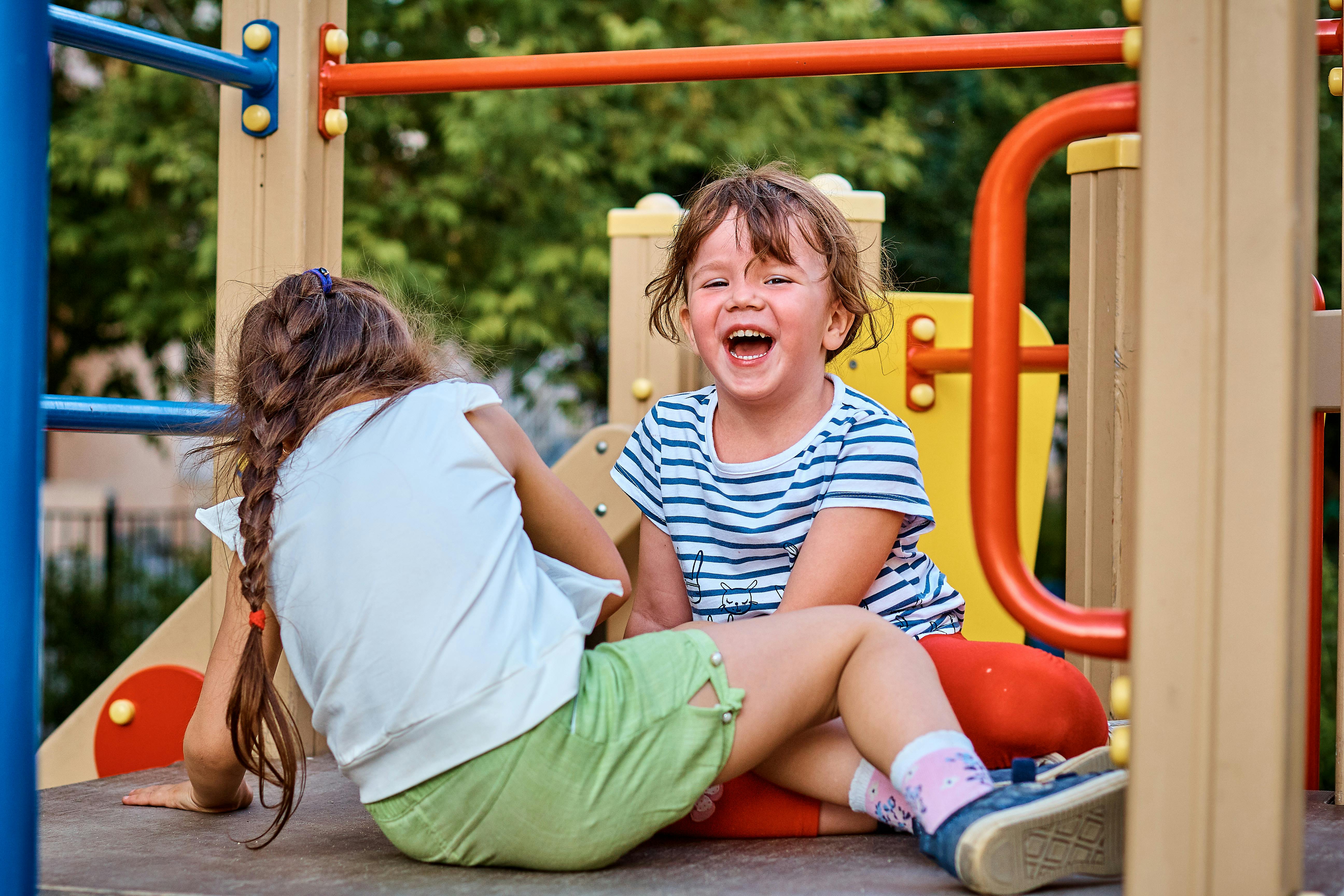 Free Girls Playing at the Playground Stock Photo