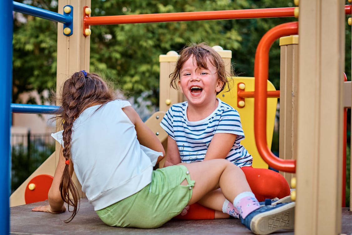 Free Girls Playing at the Playground Stock Photo