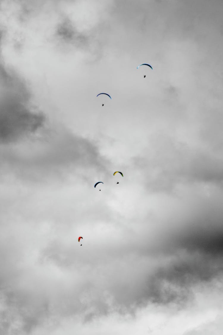 People Parachuting In The Sky