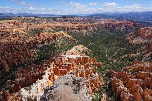 Free A breathtaking aerial view of Bryce Canyon's iconic rock formations under a bright sky in Utah. Stock Photo