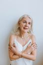 Woman in White Spaghetti Strap Top Smiling