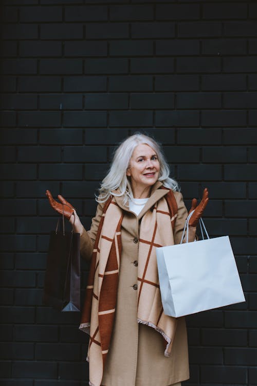 Free Elderly Woman Carrying Shopping Bags  Stock Photo