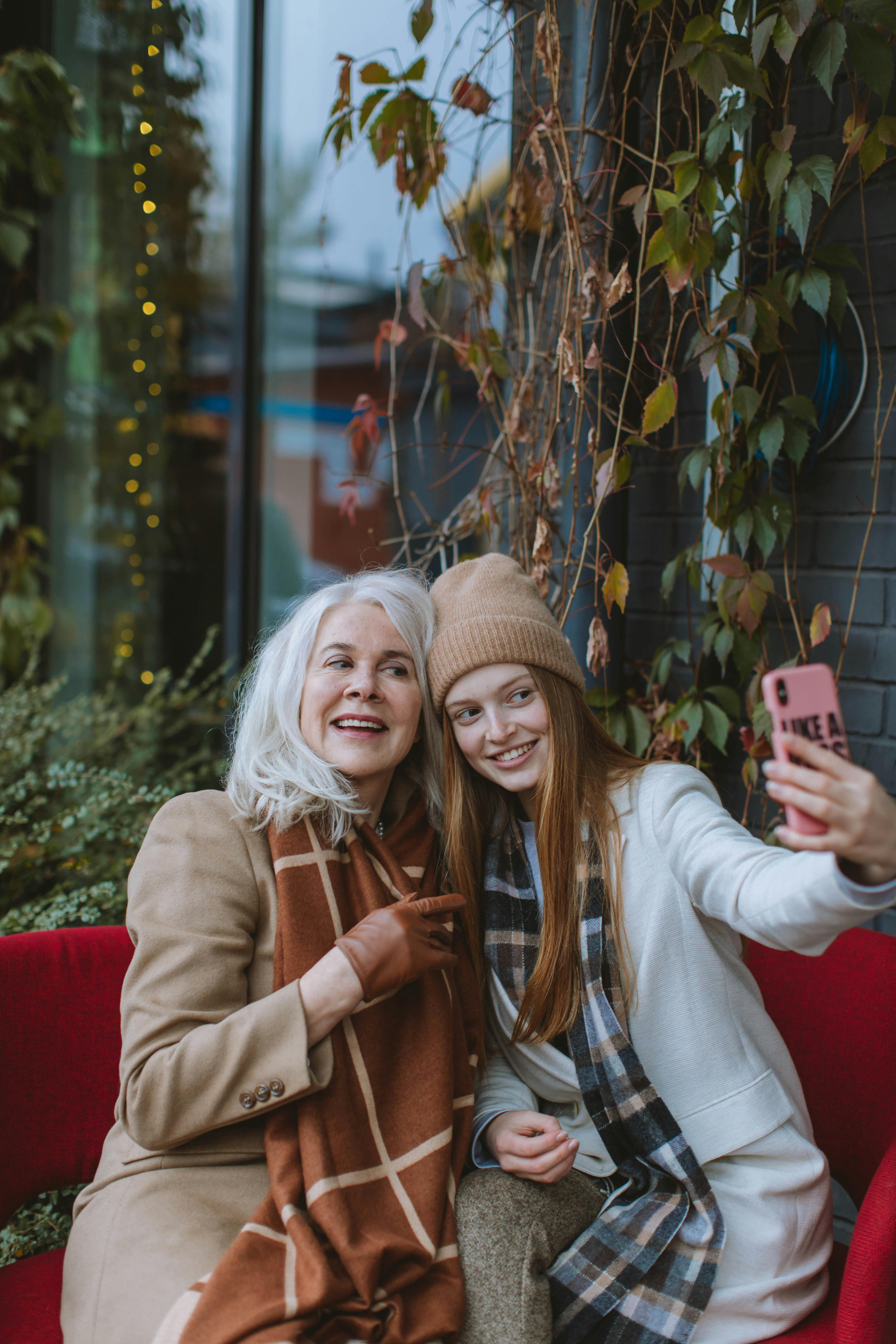 mother and daughter taking a photo together