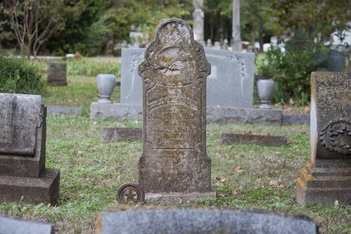 Free Grey Concrete Tomb in the Cemetery Stock Photo
