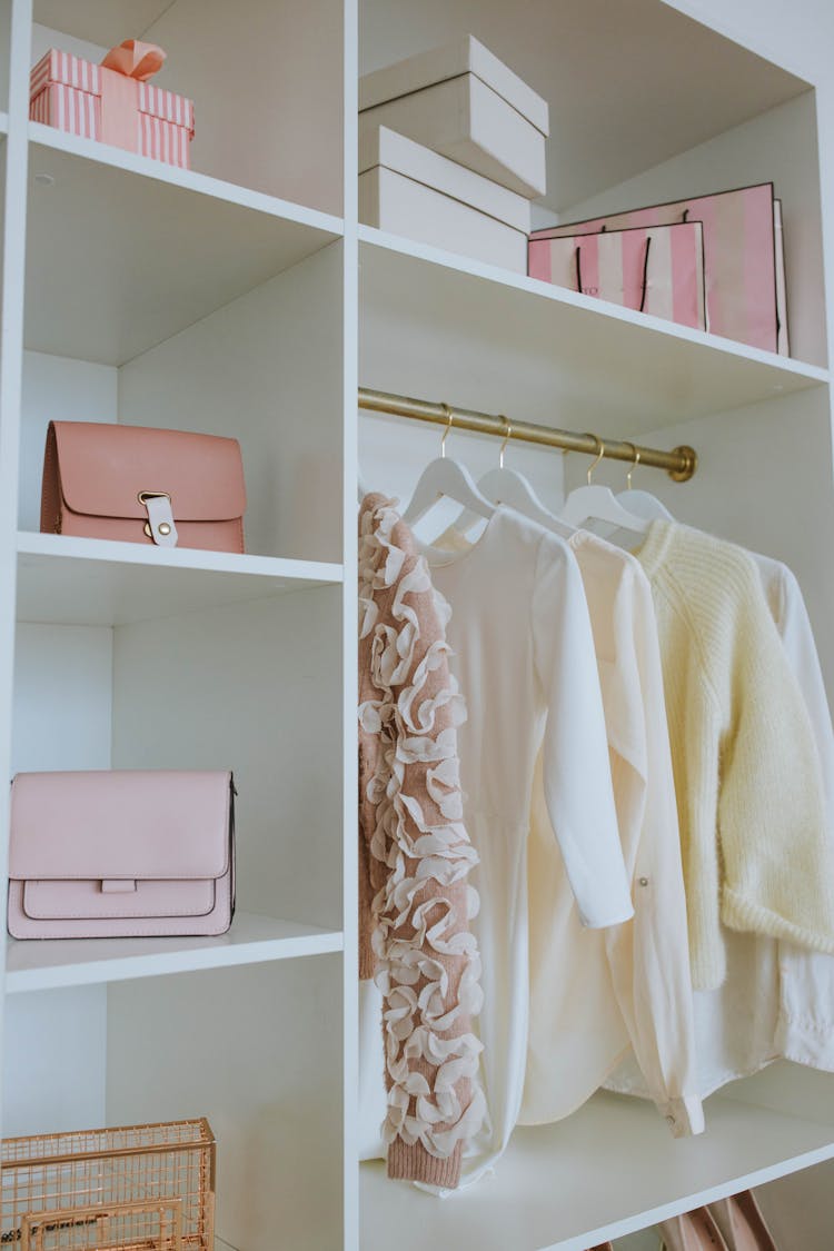 A White Wooden Closet Of A Woman