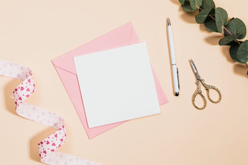 Top View of Stationary on Pink Background