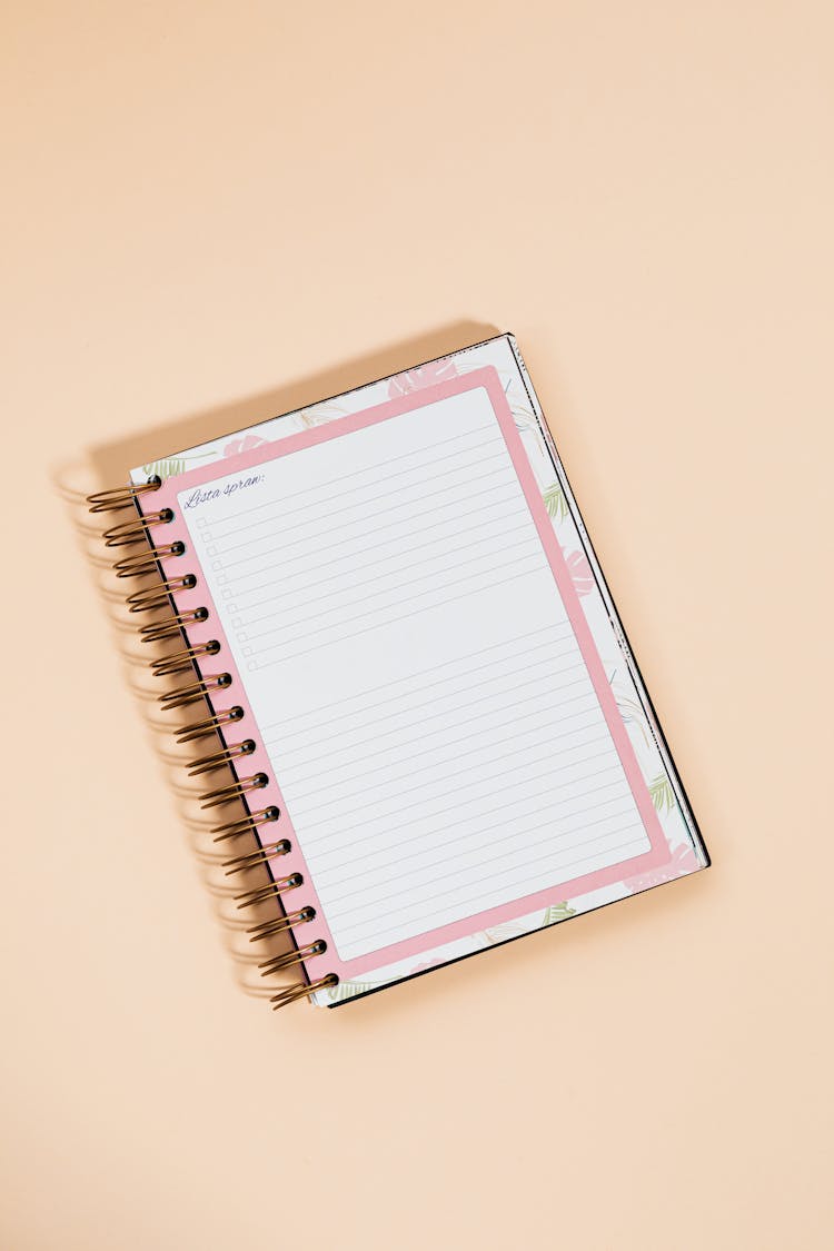 Empty Notebook Page On Baby Pink Background