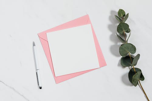 Free Top View of a Blank Piece of Paper Stock Photo