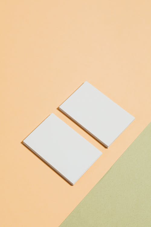 White Rectangular Paper on Beige and Olive Background