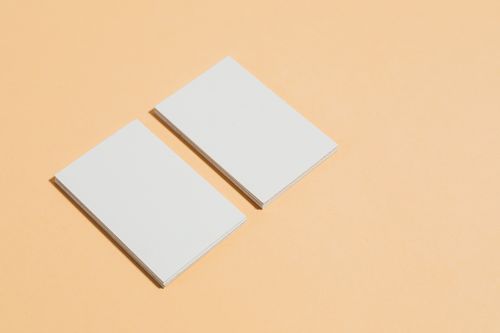 Blank cards on a warm background, by Kaboompics on Pexels