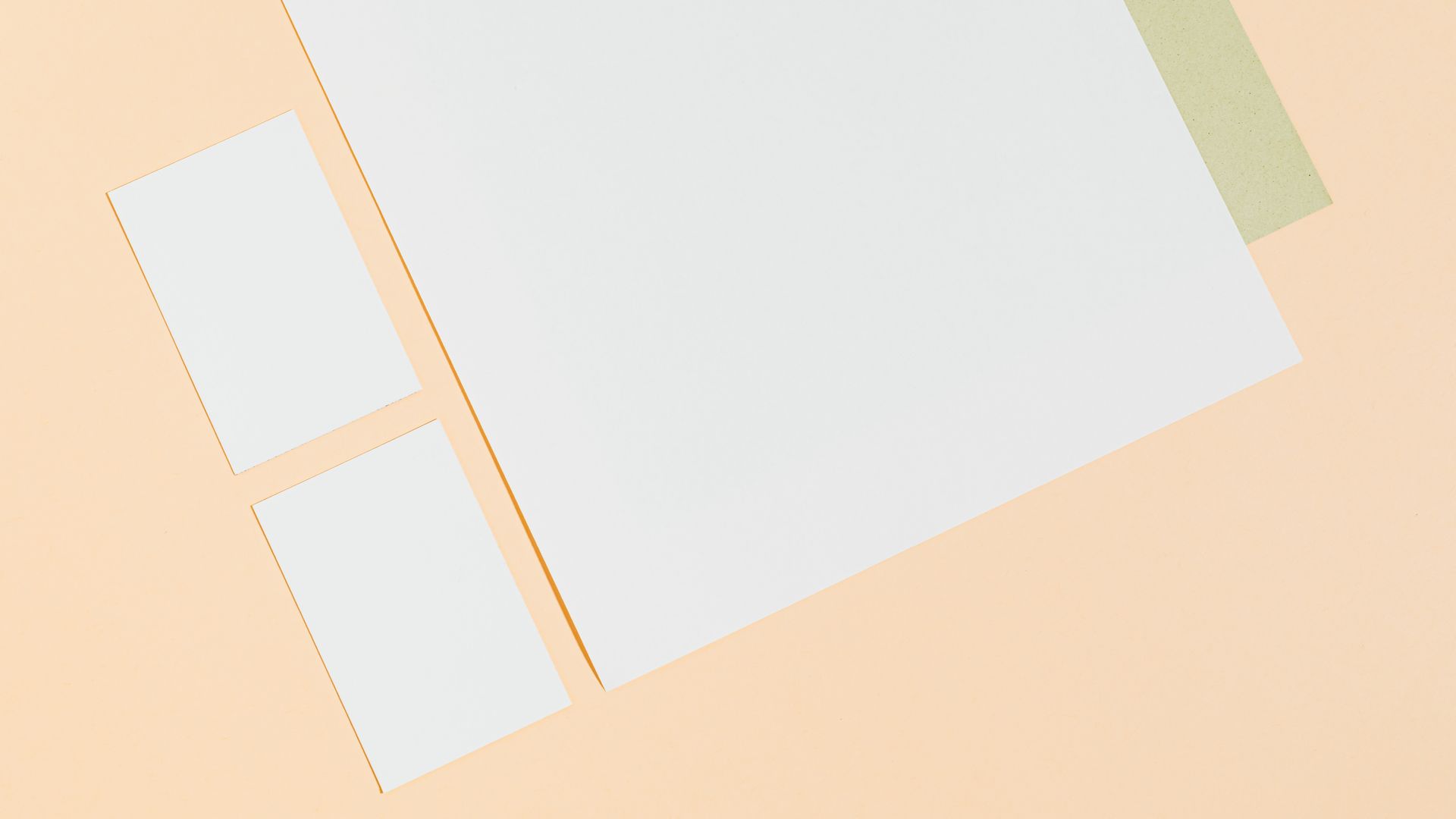 Letter Pads: Your Essential Stationery Companion 3 Abstract arrangement of blank paper sheets on soft yellow background, perfect for copyspace — letter pads