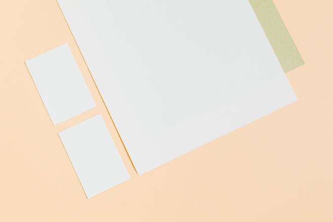 Blank stationery sheets on a warm sand background — photo by Kaboompics.com on Pexels