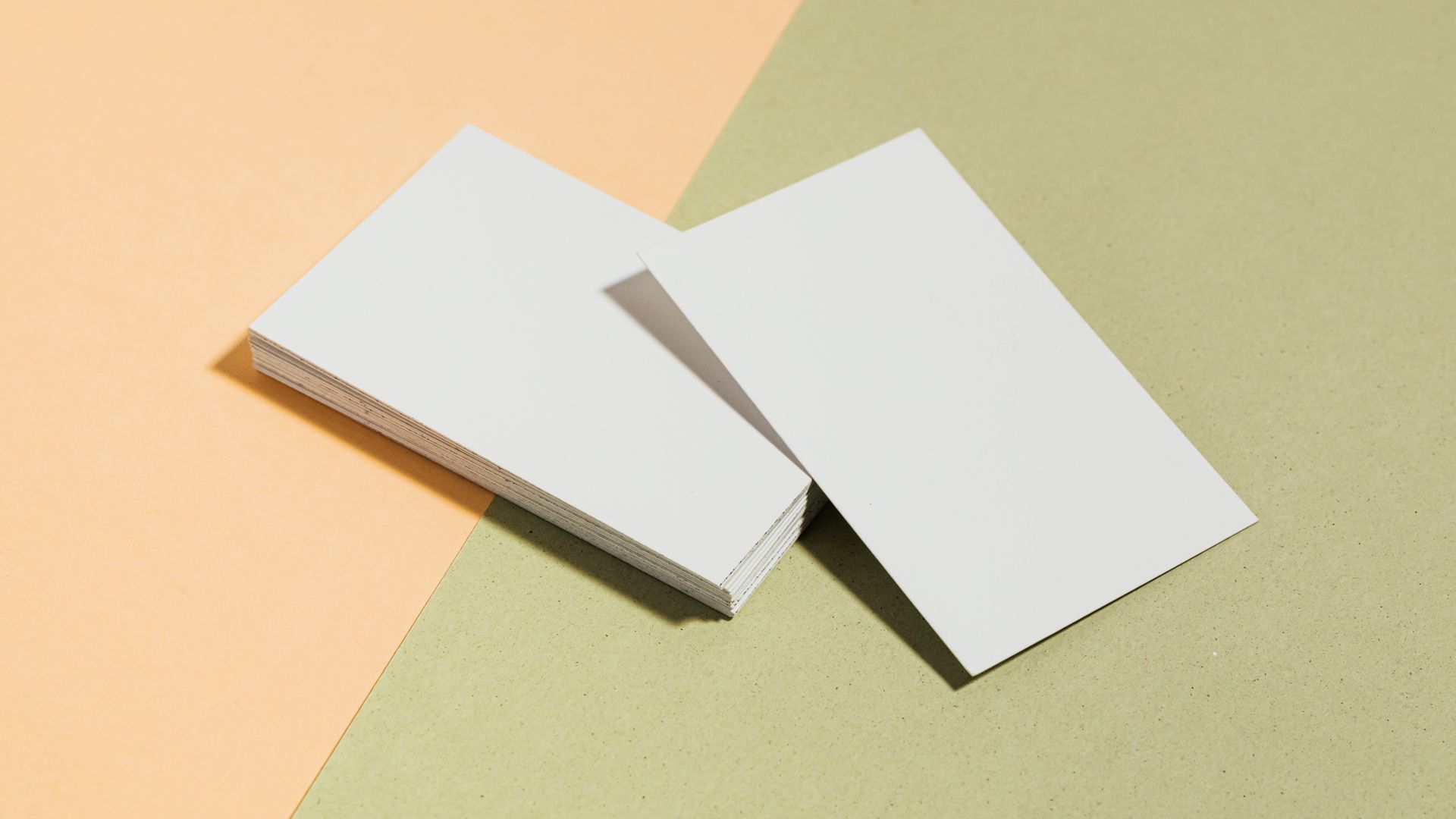 ID Cards: Your Essential Identification Companion 3 Stack of blank white business cards on pastel surface offering copy space for design — id cards