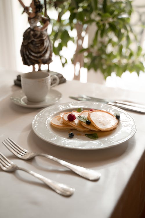 Pancakes on White Ceramic Plate 
